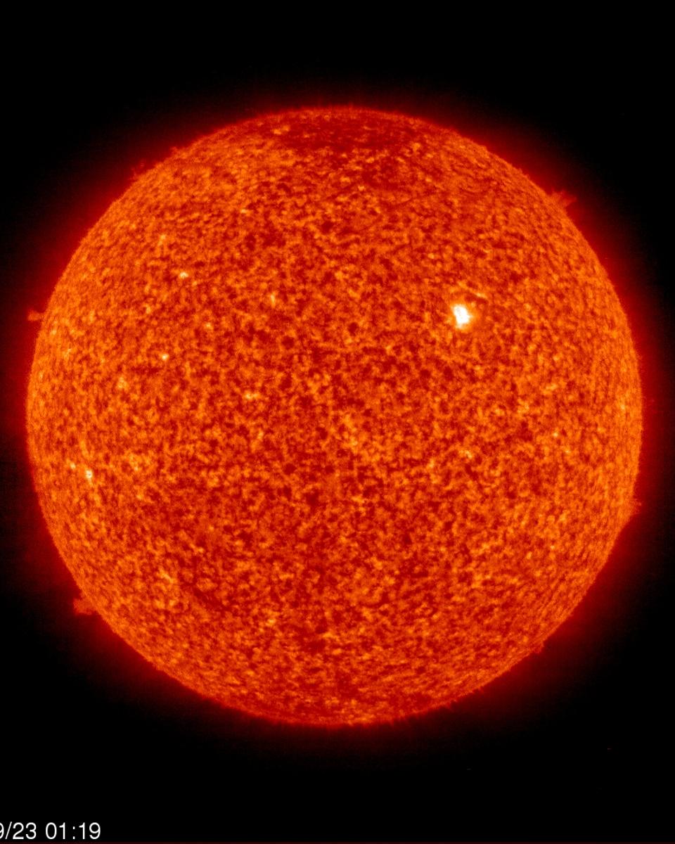 Active Region 1002 on an Unusually Quiet Sun