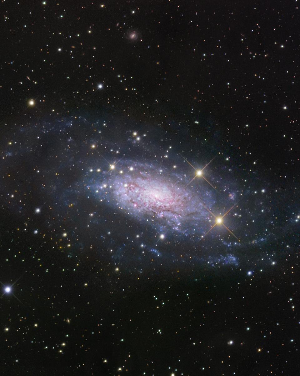 NGC 3621: Far Beyond the Local Group