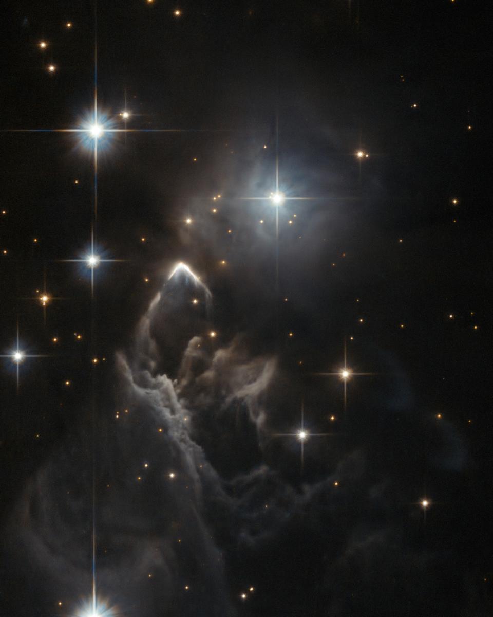IRAS 05437+2502: An Enigmatic Star Cloud from Hubble