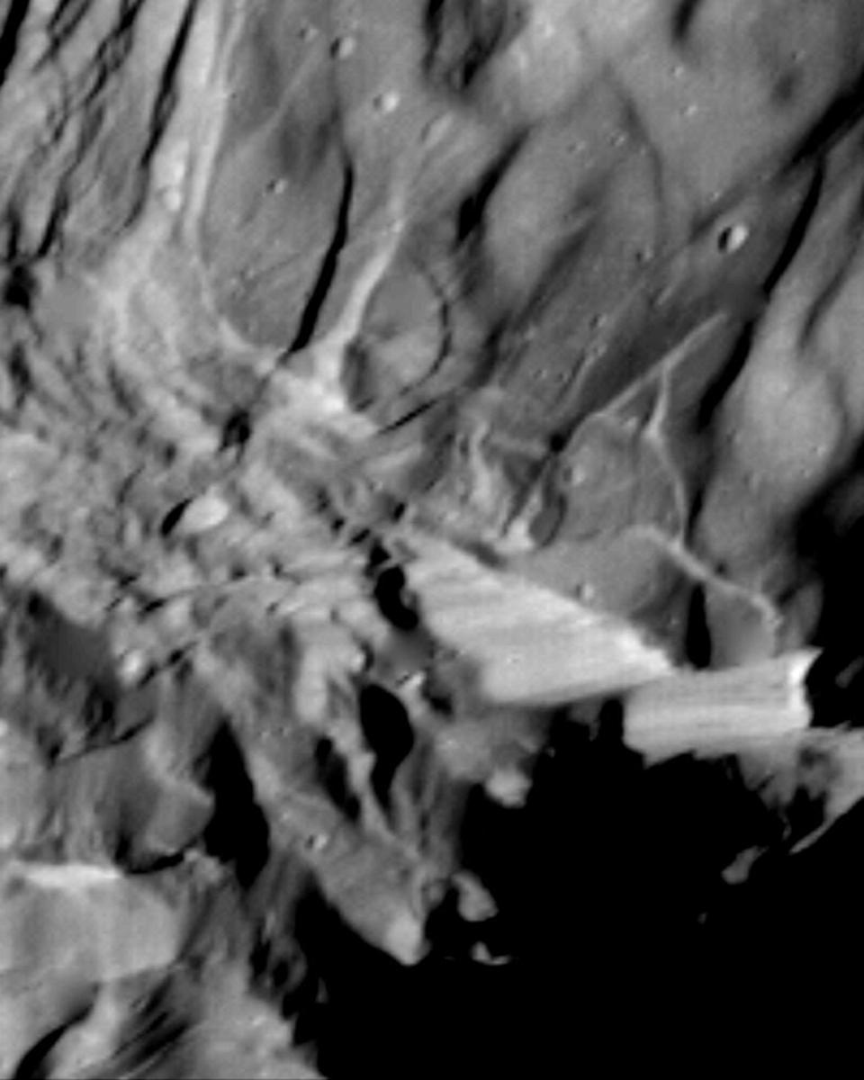 Verona Rupes: Tallest Known Cliff in the Solar System
