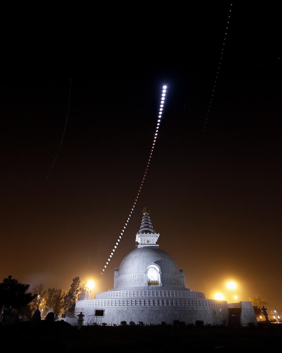 A Lunar Eclipse Over an Indian Peace Pagoda