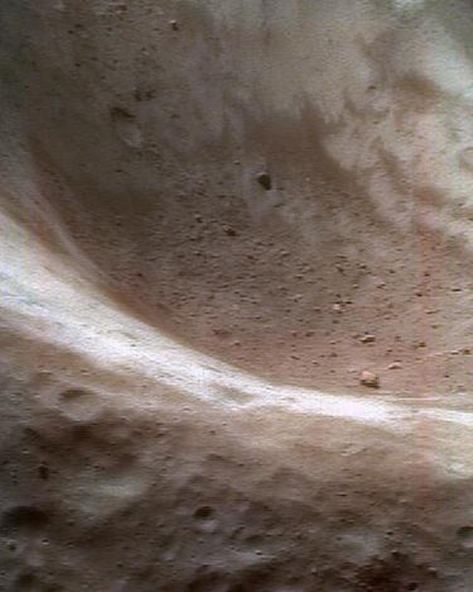 The Regolith of Asteroid Eros