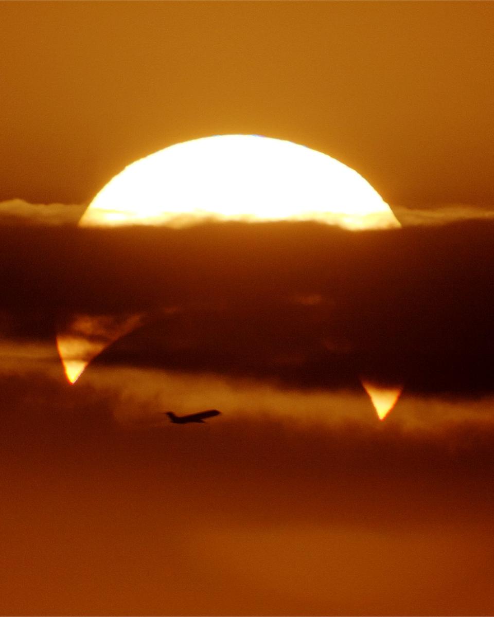 Partial Solar Eclipse with Airplane
