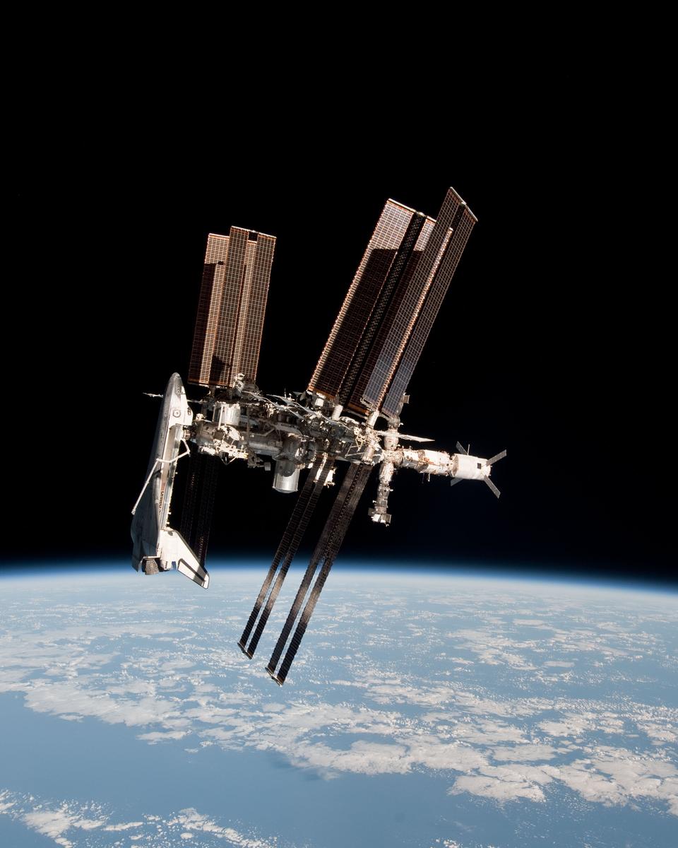 Space Shuttle and Space Station Photographed Together