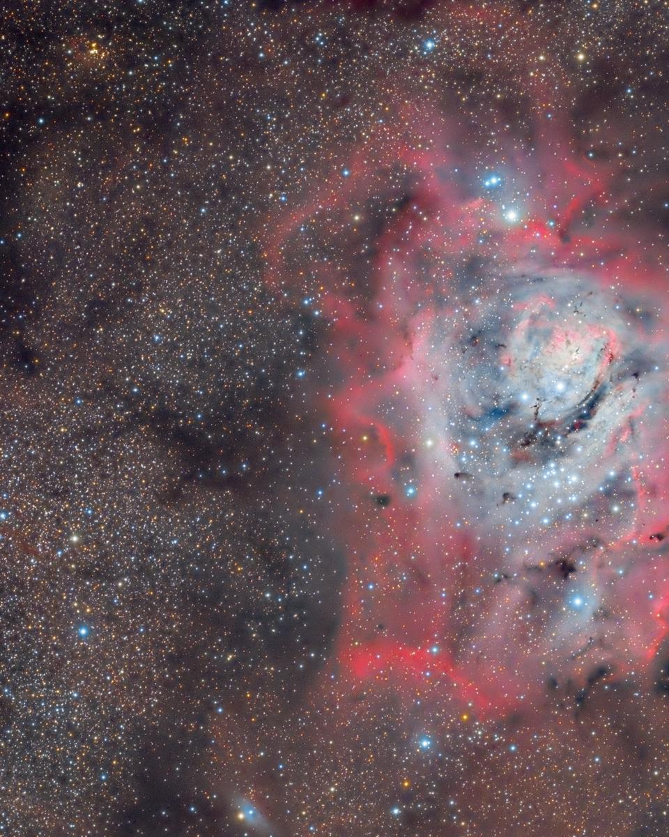 The Lagoon Nebula in Stars Dust and Gas