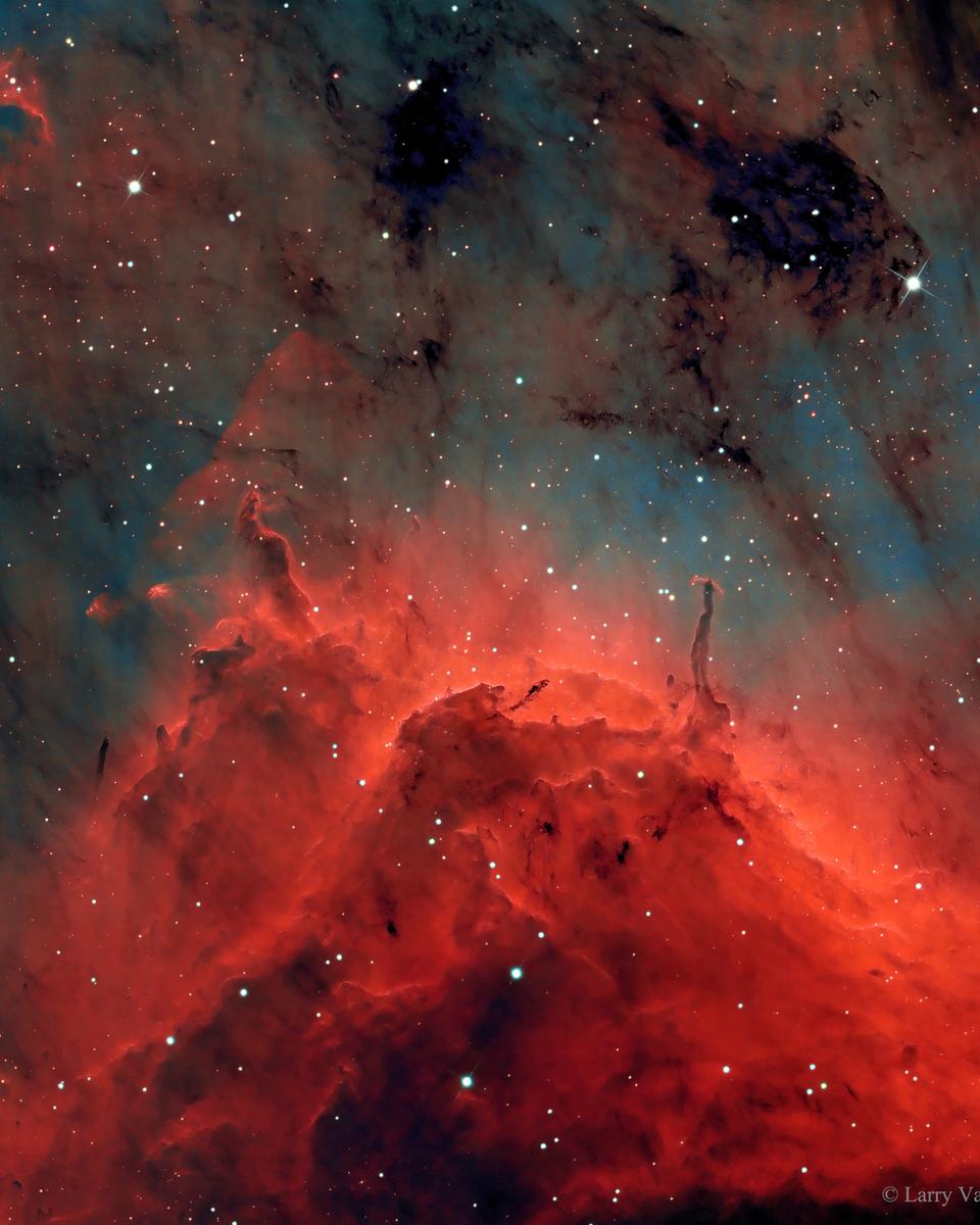 Pillars and Jets in the Pelican Nebula