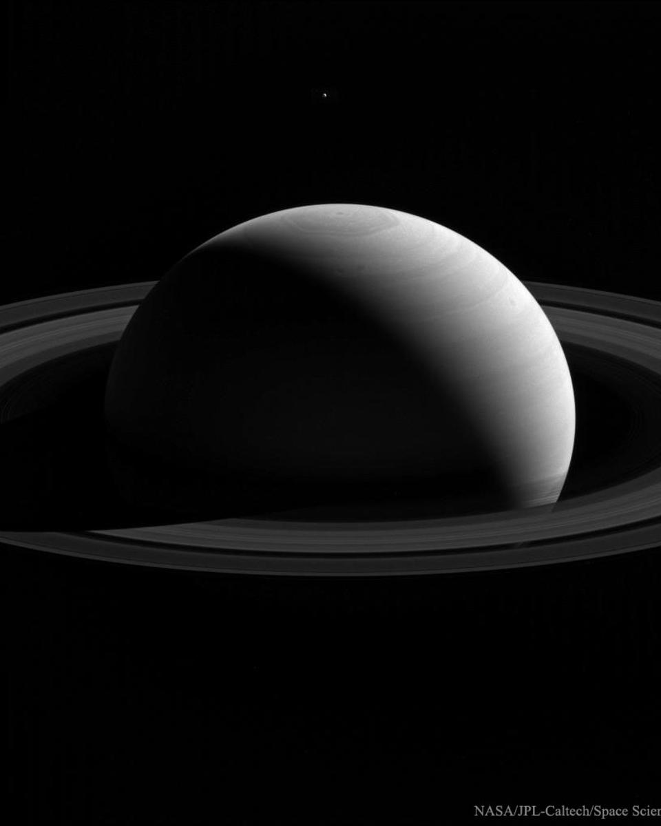 Behind Saturn