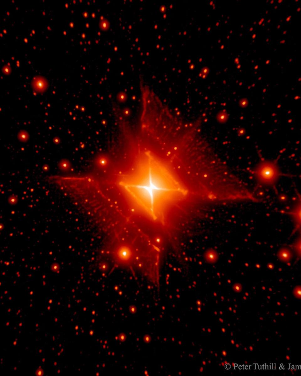 MWC 922: The Red Square Nebula