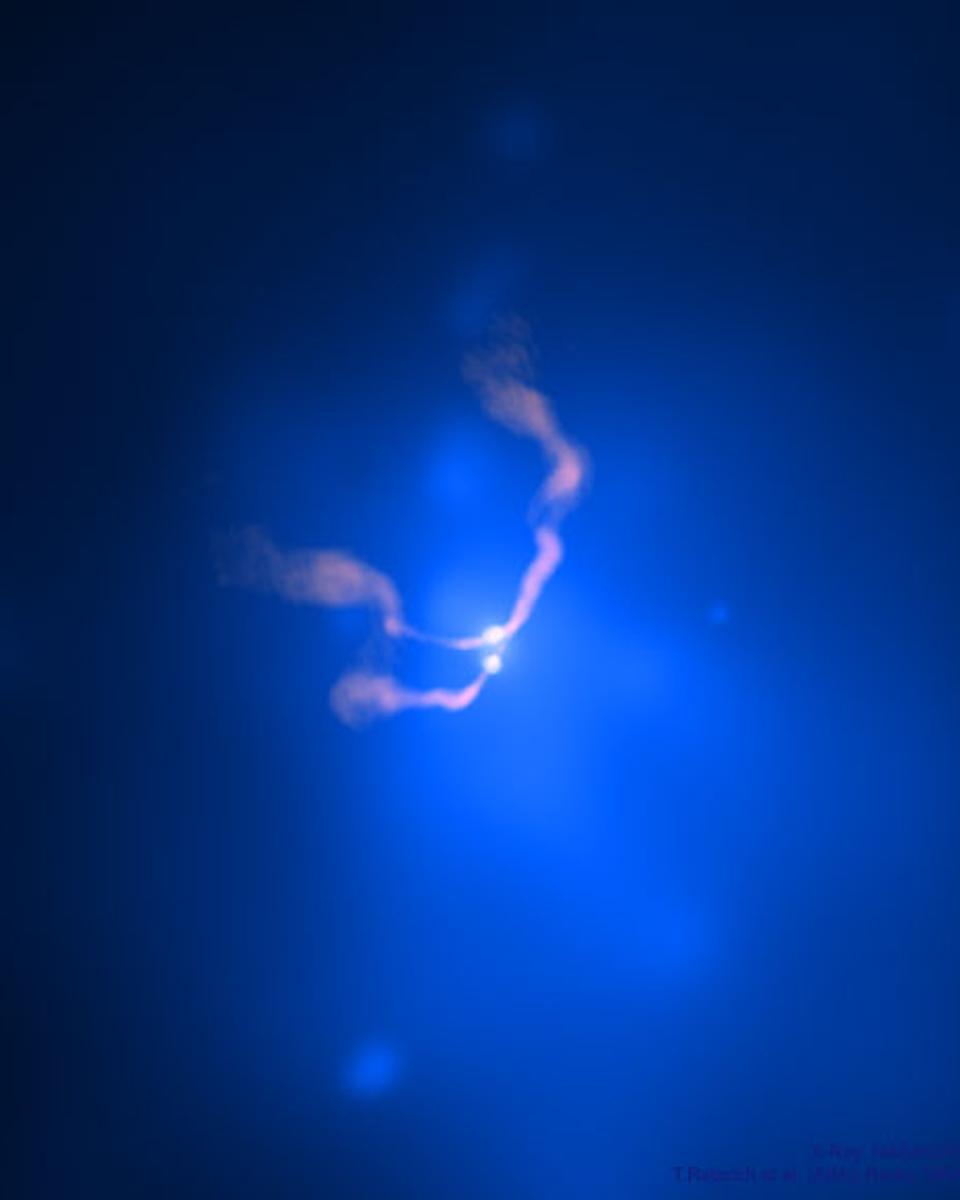 Two Black Holes Dancing in 3C 75