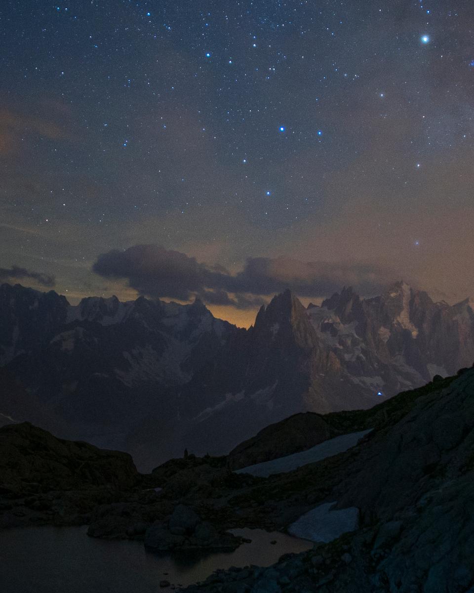 Eclipsed Moon and Mars over Mountains