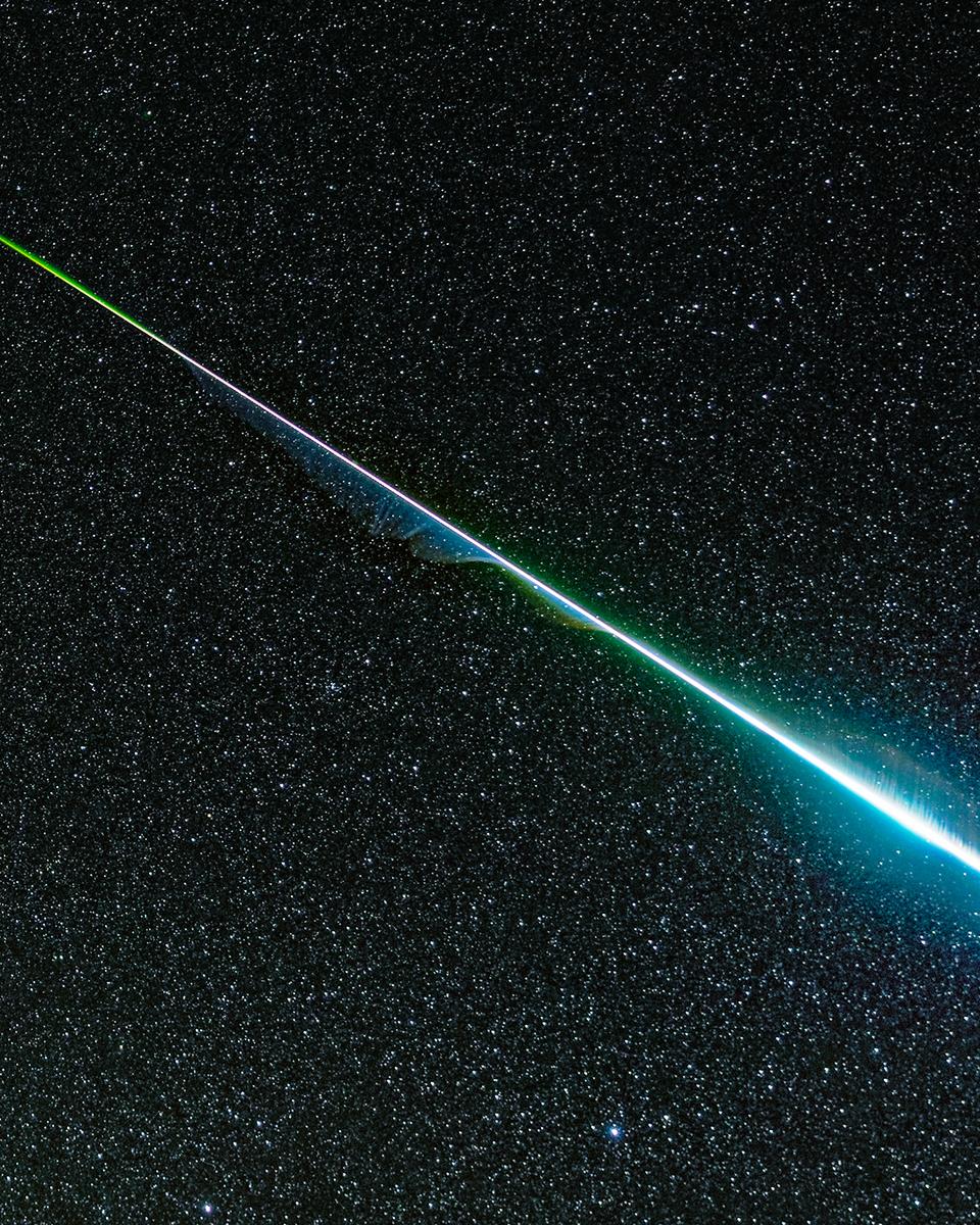 A Rainbow Geminid Meteor