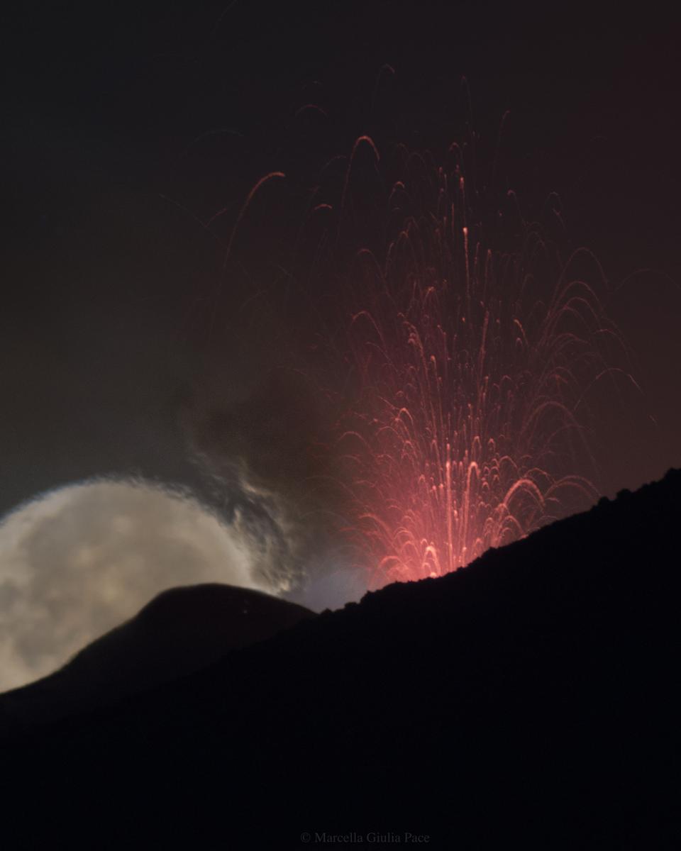 Moon behind Lava Fountain
