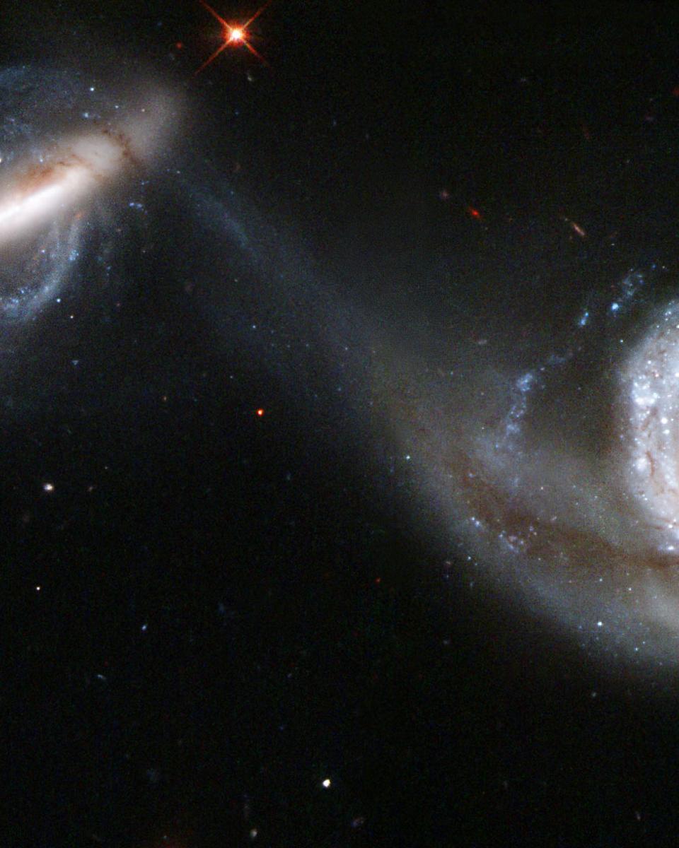 Arp 87: Merging Galaxies from Hubble