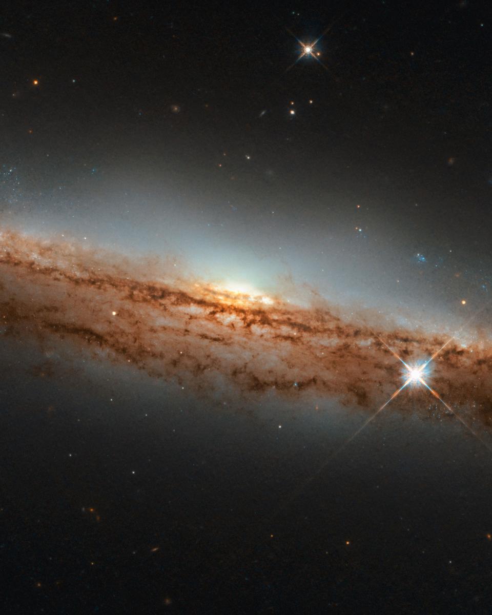 NGC 3717: A Nearly Sideways Spiral Galaxy