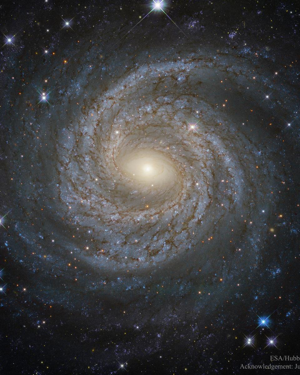 NGC 6814: Grand Design Spiral Galaxy from Hubble