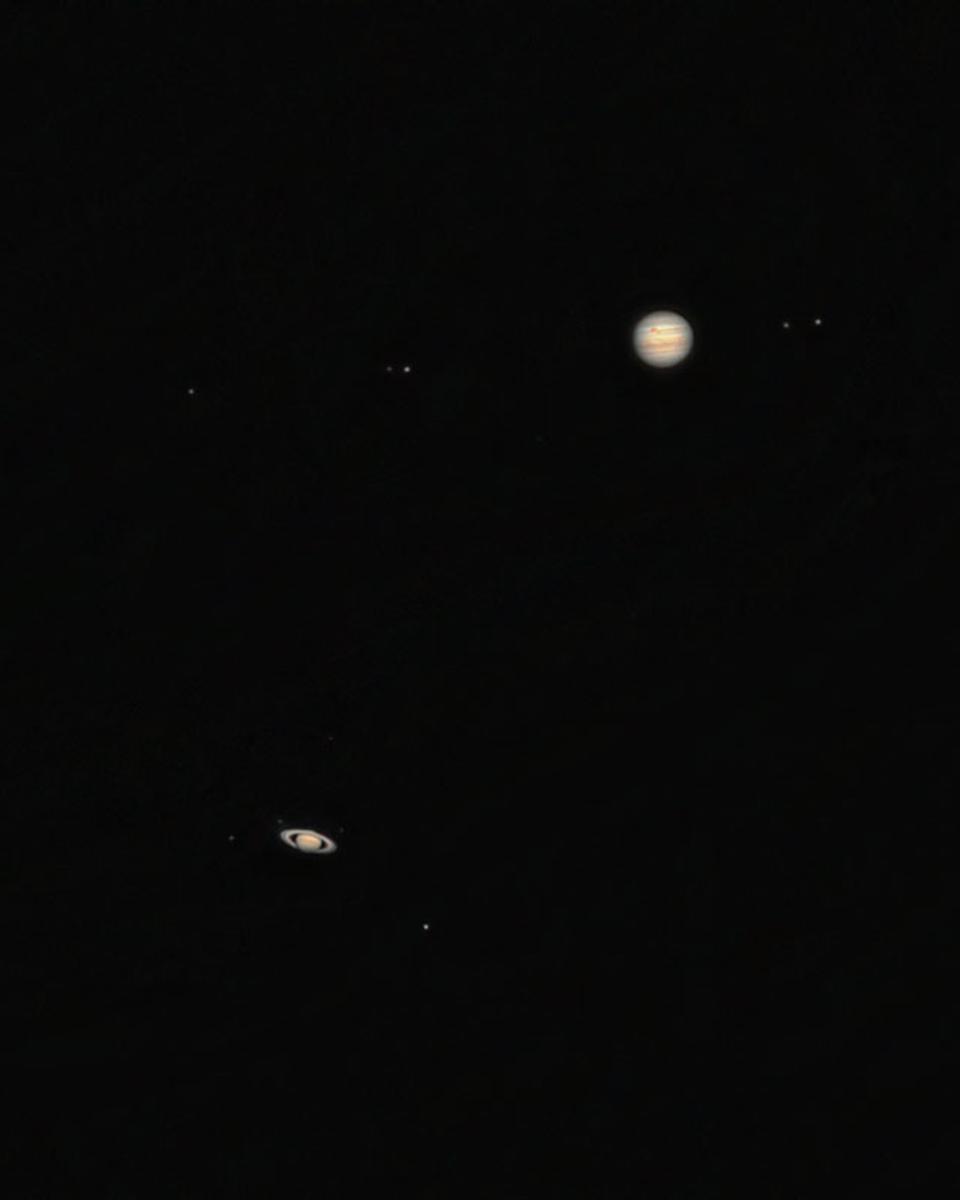 Jupiter Meets Saturn: A Red Spotted Great Conjunction