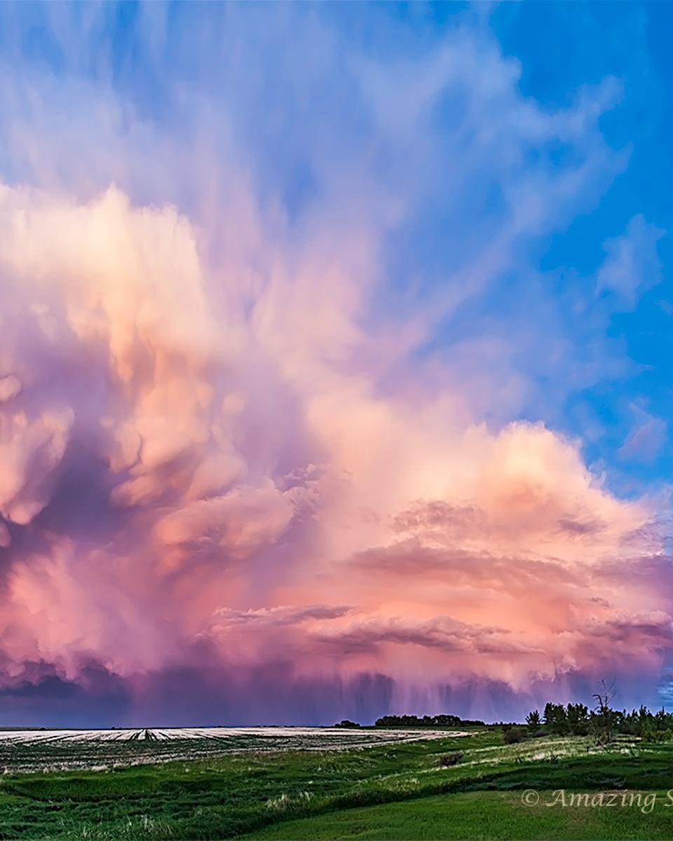 A Retreating Thunderstorm at Sunset