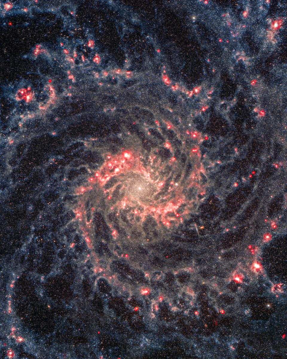 Spiral Galaxy M74: A Sharper View