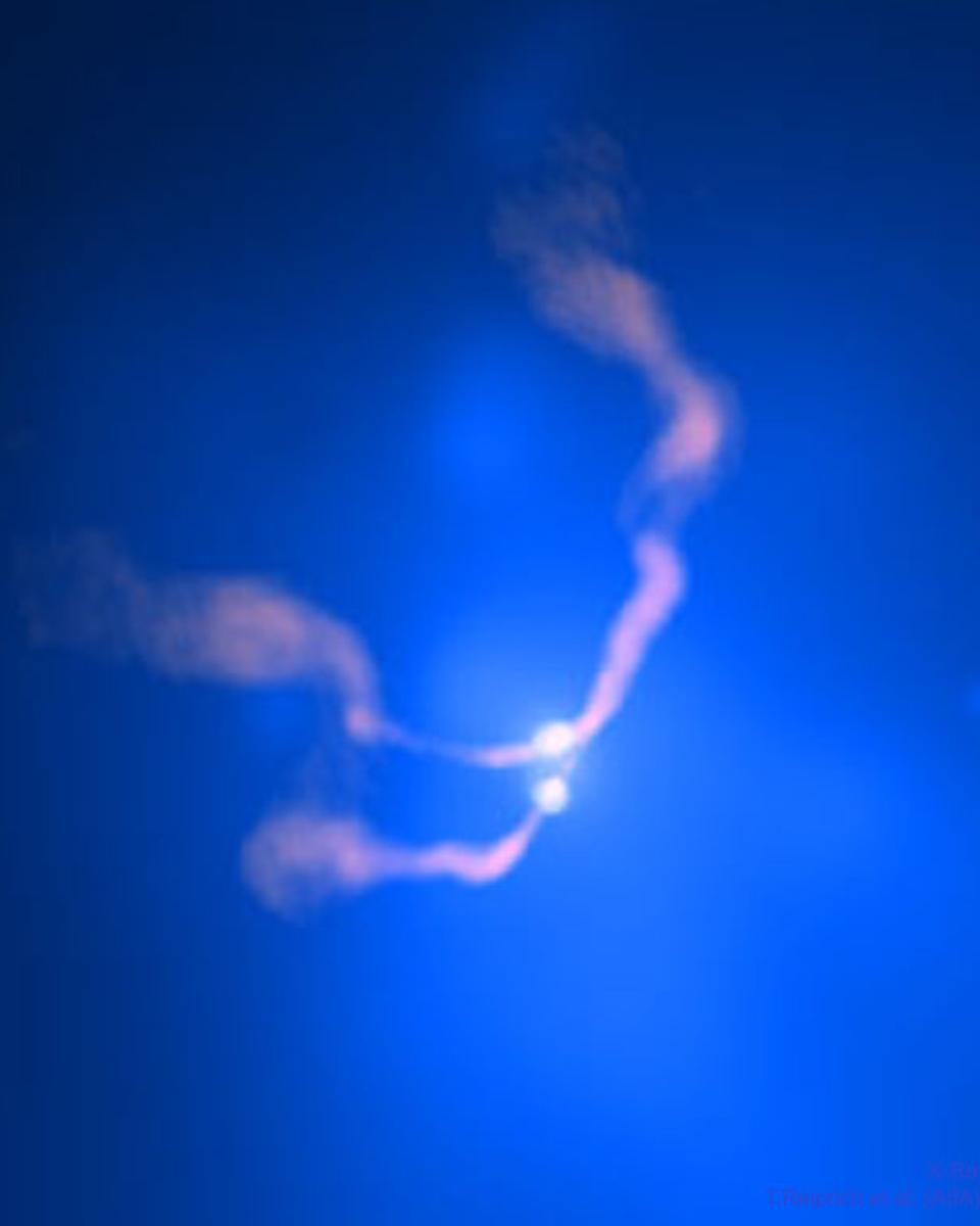 Two Black Holes Dancing in 3C 75