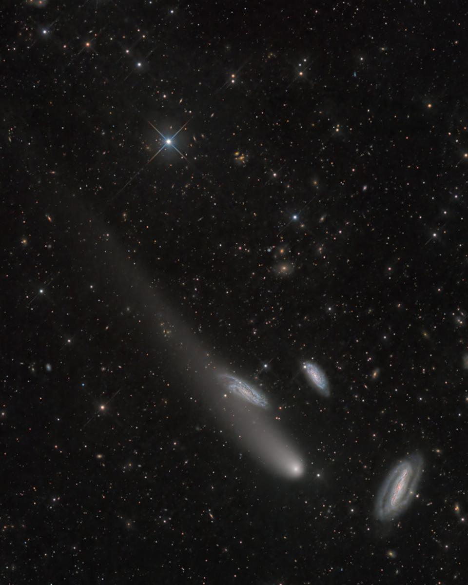Three Galaxies and a Comet