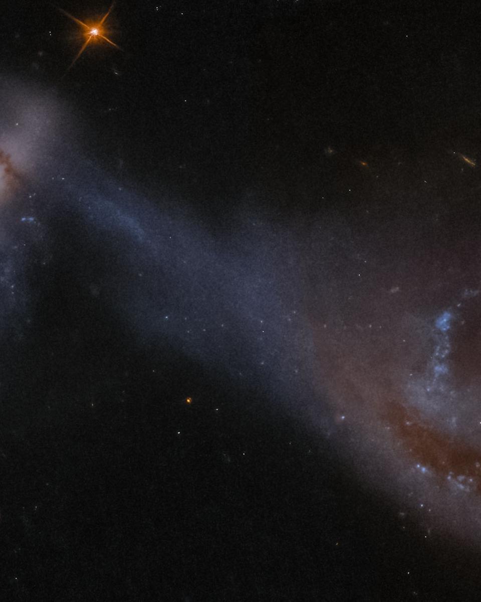 Arp 87: Merging Galaxies from Hubble