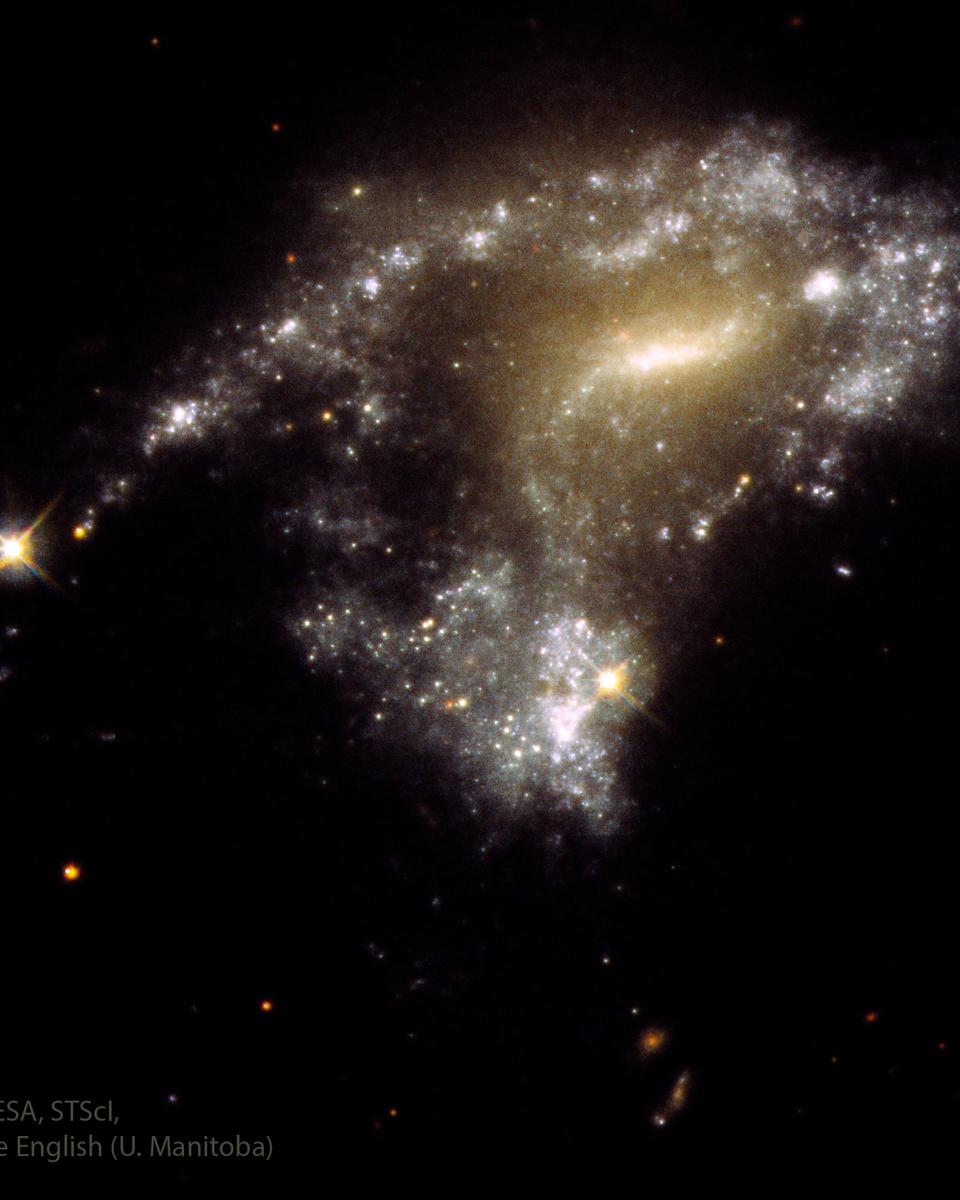 AM1054: Stars Form as Galaxies Collide