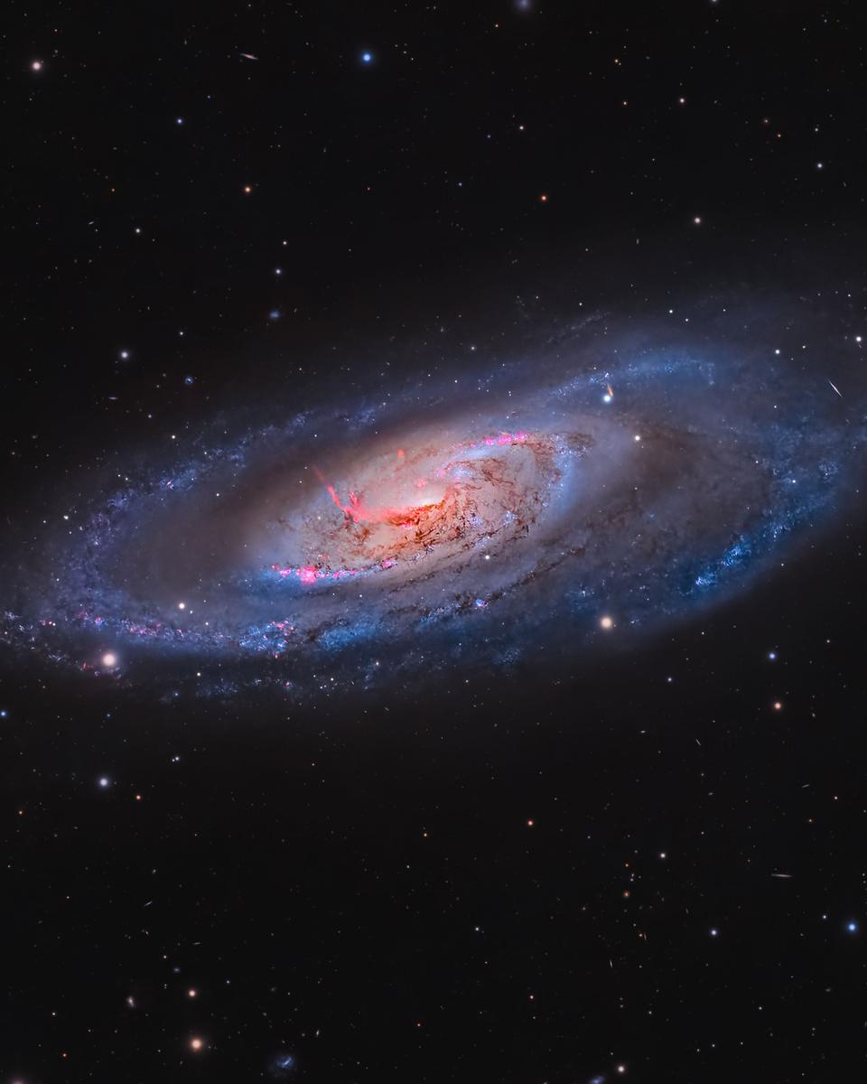 M106: A Spiral Galaxy with a Strange Center