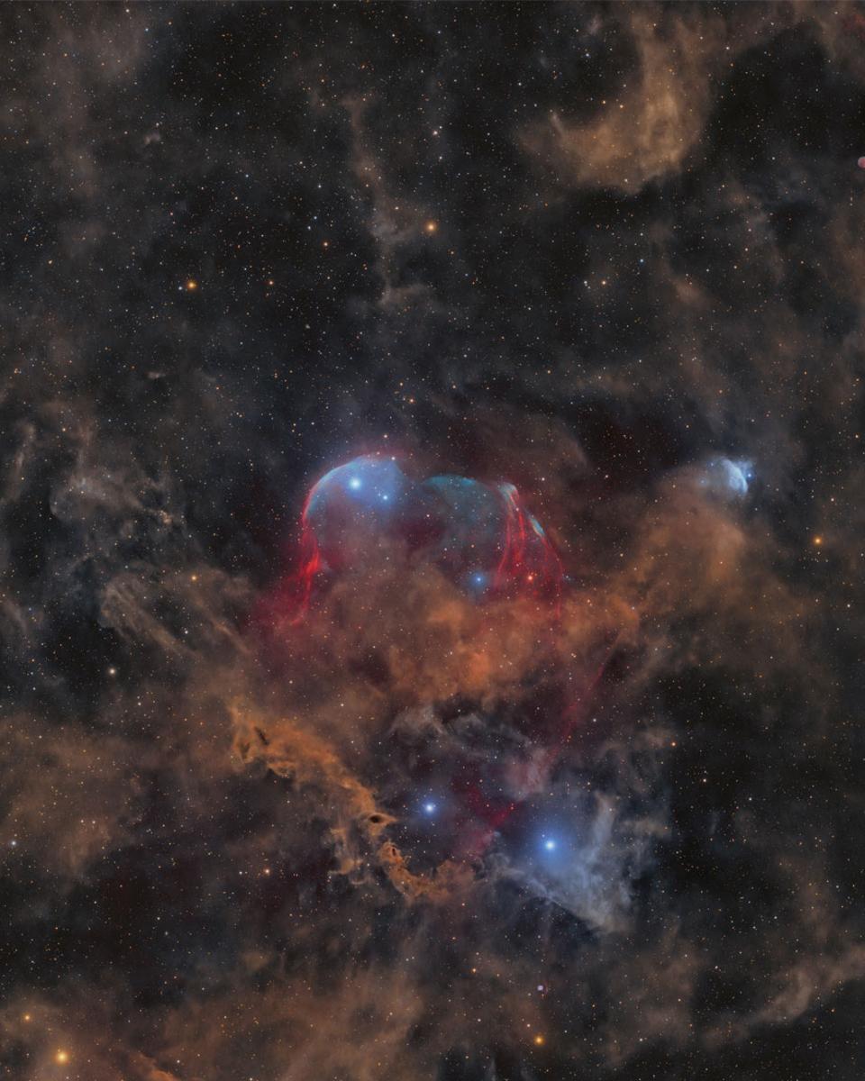 Between Scylla and Charybdis: A Double Cosmic Discovery
