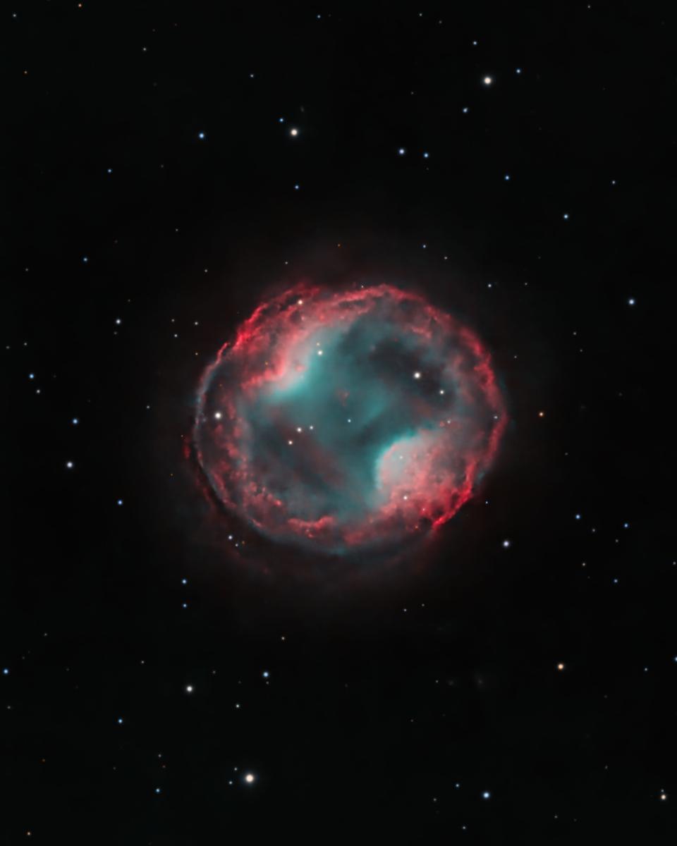 PK 164 +31.1: The Headphone Nebula