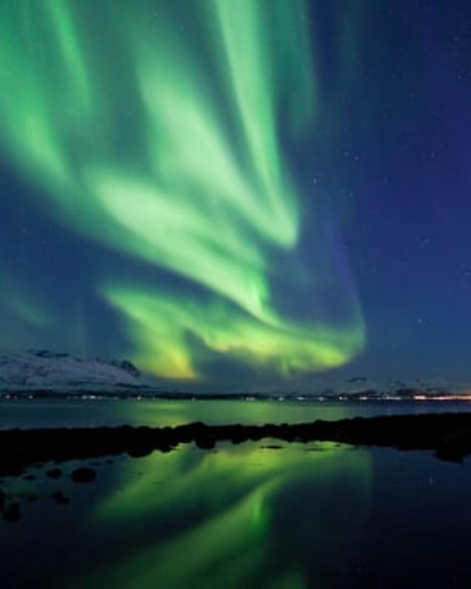 Flowing Auroras Over Norway