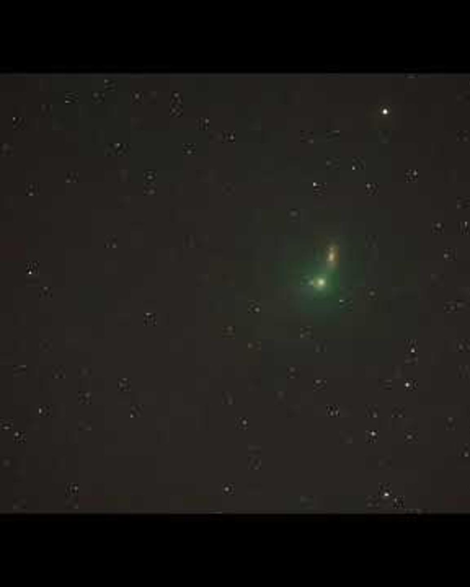 Comet Iwamoto Before Spiral Galaxy NGC 2903